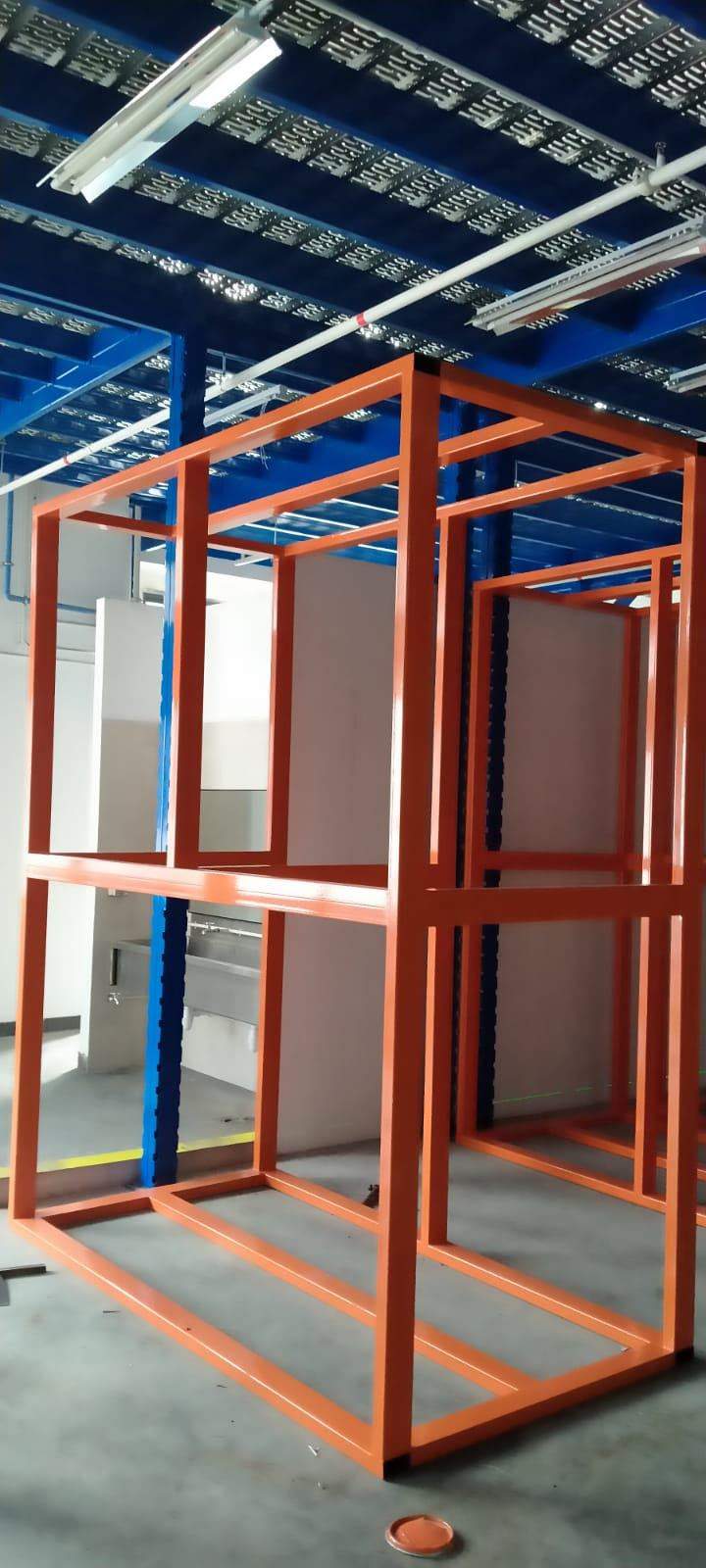 Custom orange steel frame fabrication
